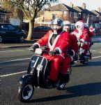 Salford Santa Scooter Run  to The Christie